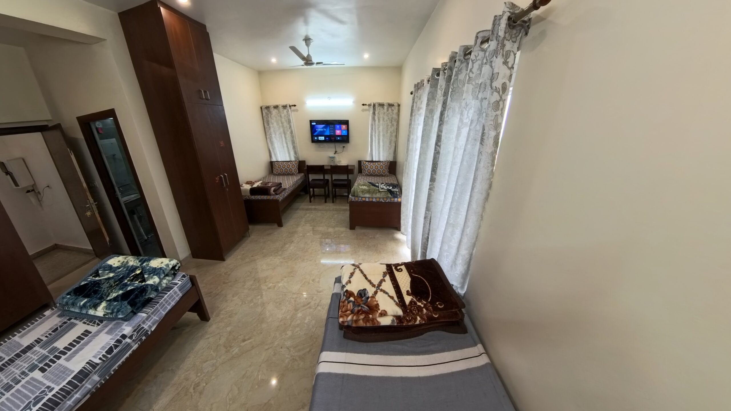 TV, Almira, Study Tables & Chairs & Bathroom, Quad Bed PG Girls Rooms; Shree Rudra Home Stays